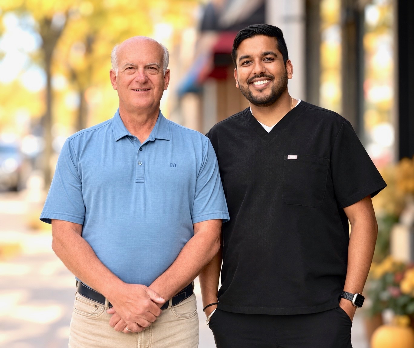 Doctors Carlson and Singla standing outside